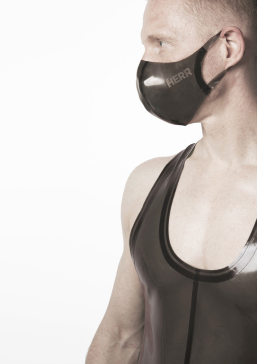 Male model with smoky black translucent rubber face mask